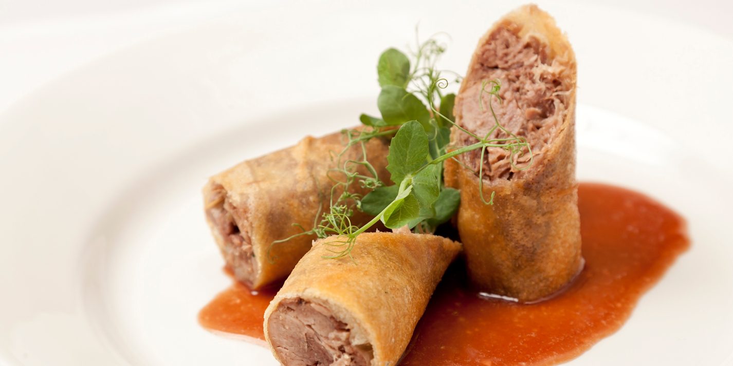 Crispy duck spring rolls with barbecue sauce